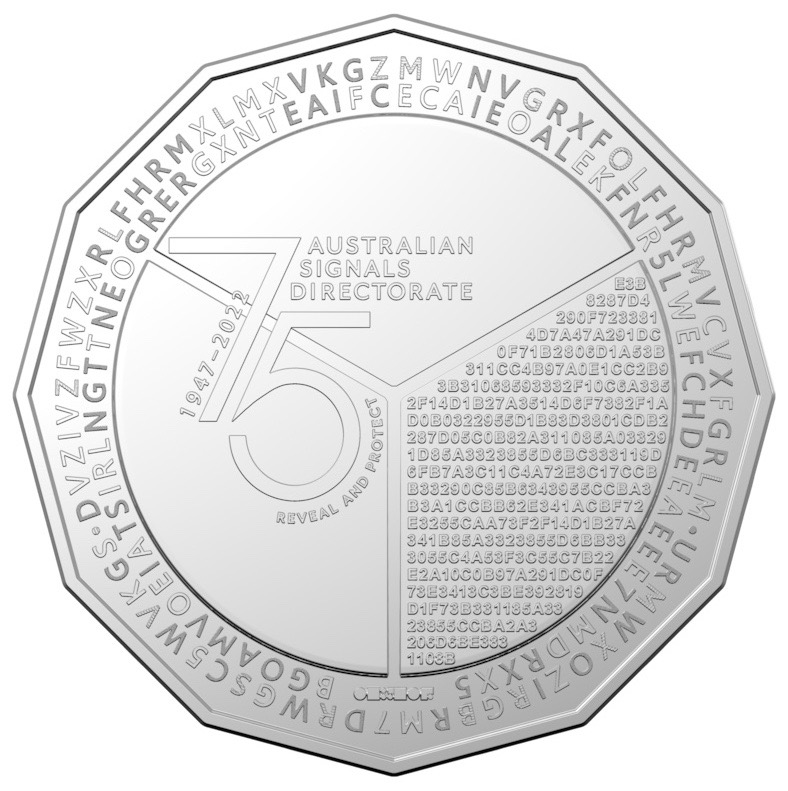 An Australian 50 cent piece minted by the Australian intelligence agency, with encrypted ciphertext around the coin.