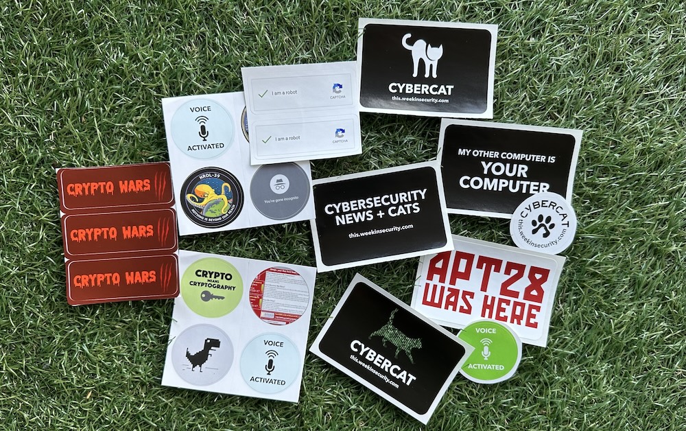 A photo of a series of stickers on a grassy background.